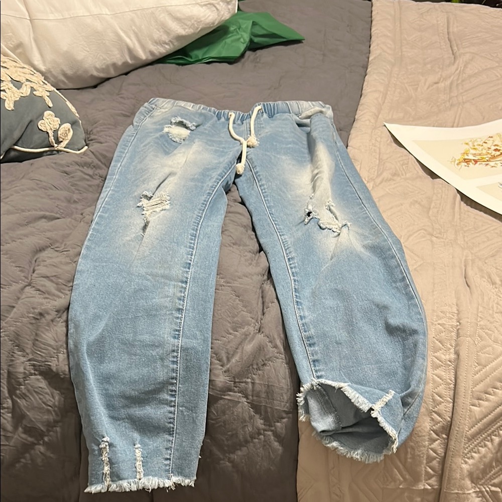 Blue Distressed Jeggings with Raw Hem